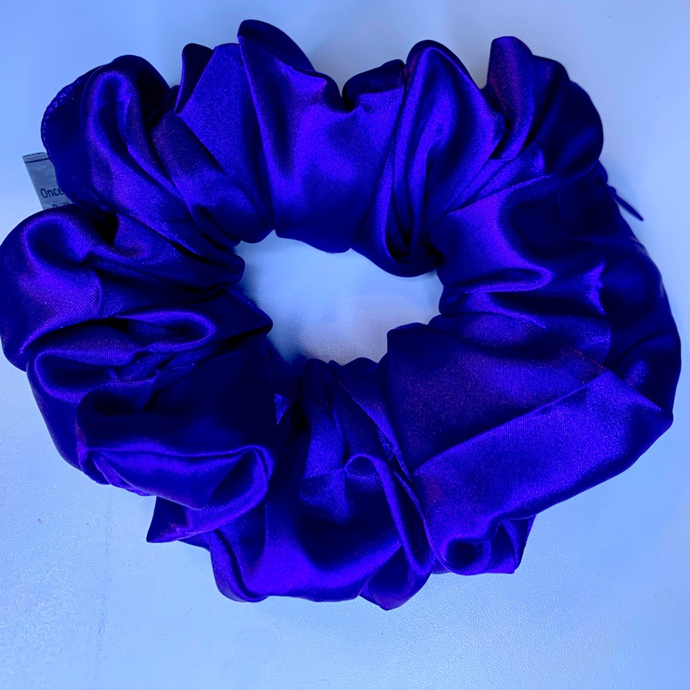 Large satin purple scrunchie with hidden zipper pocket. For runners, game day